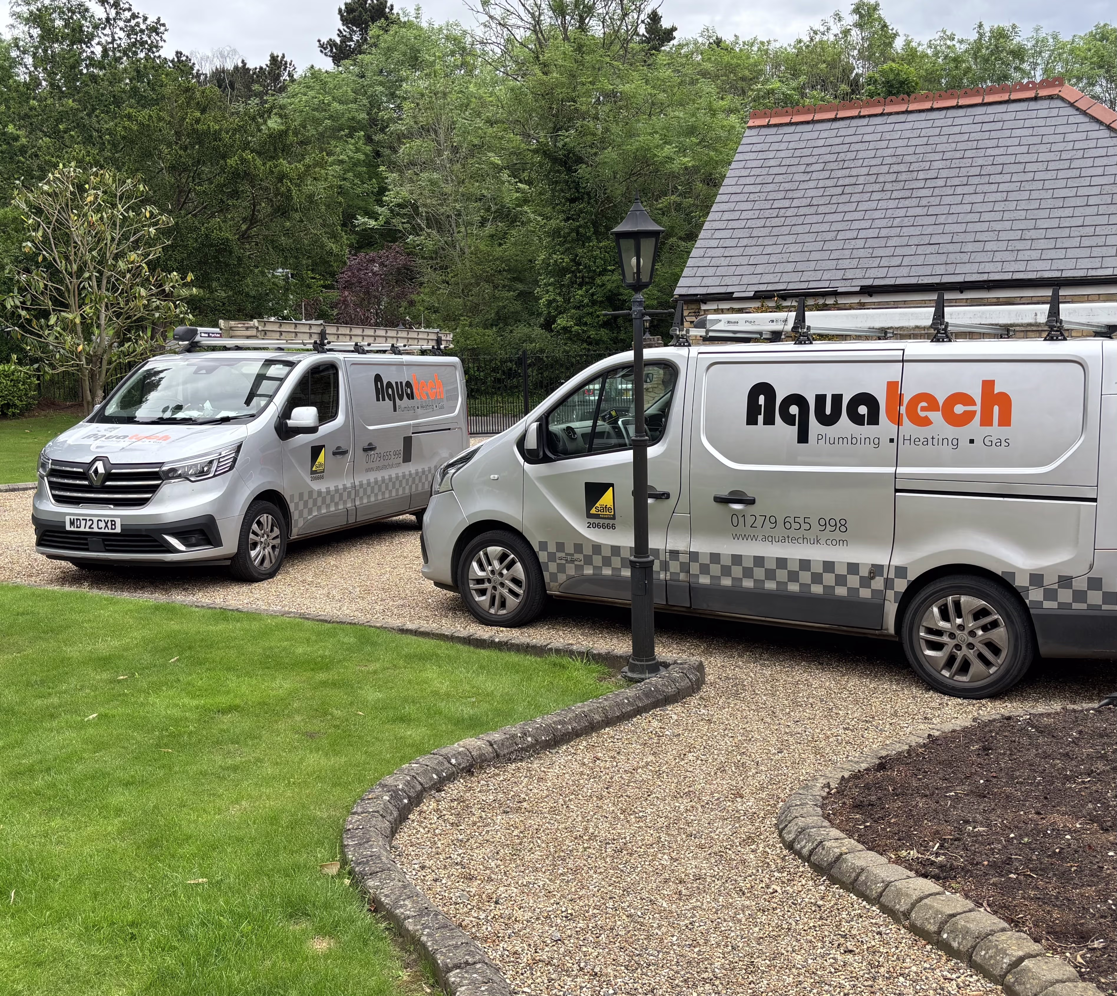 professional plumbing team with tools and uniforms, friendly service